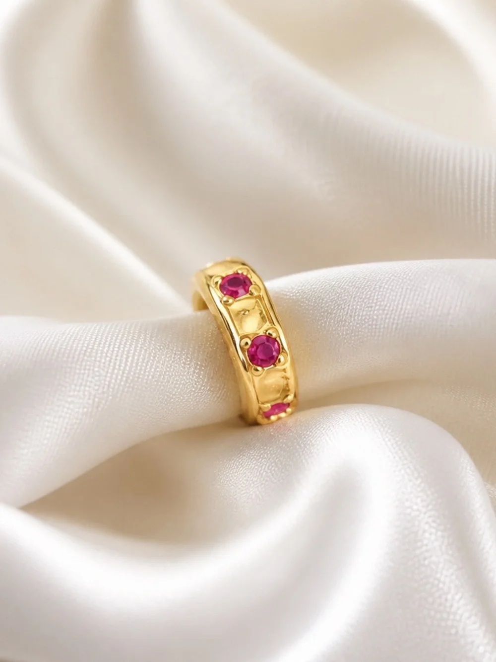 Gold-Plated Charm with pink Gemstones